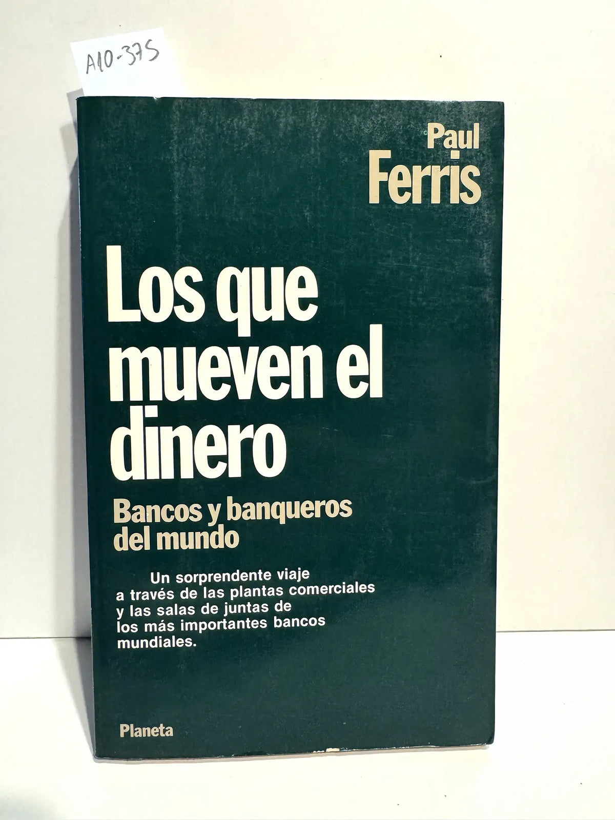 Los que mueven el dinero. — FERRIS, Paul.